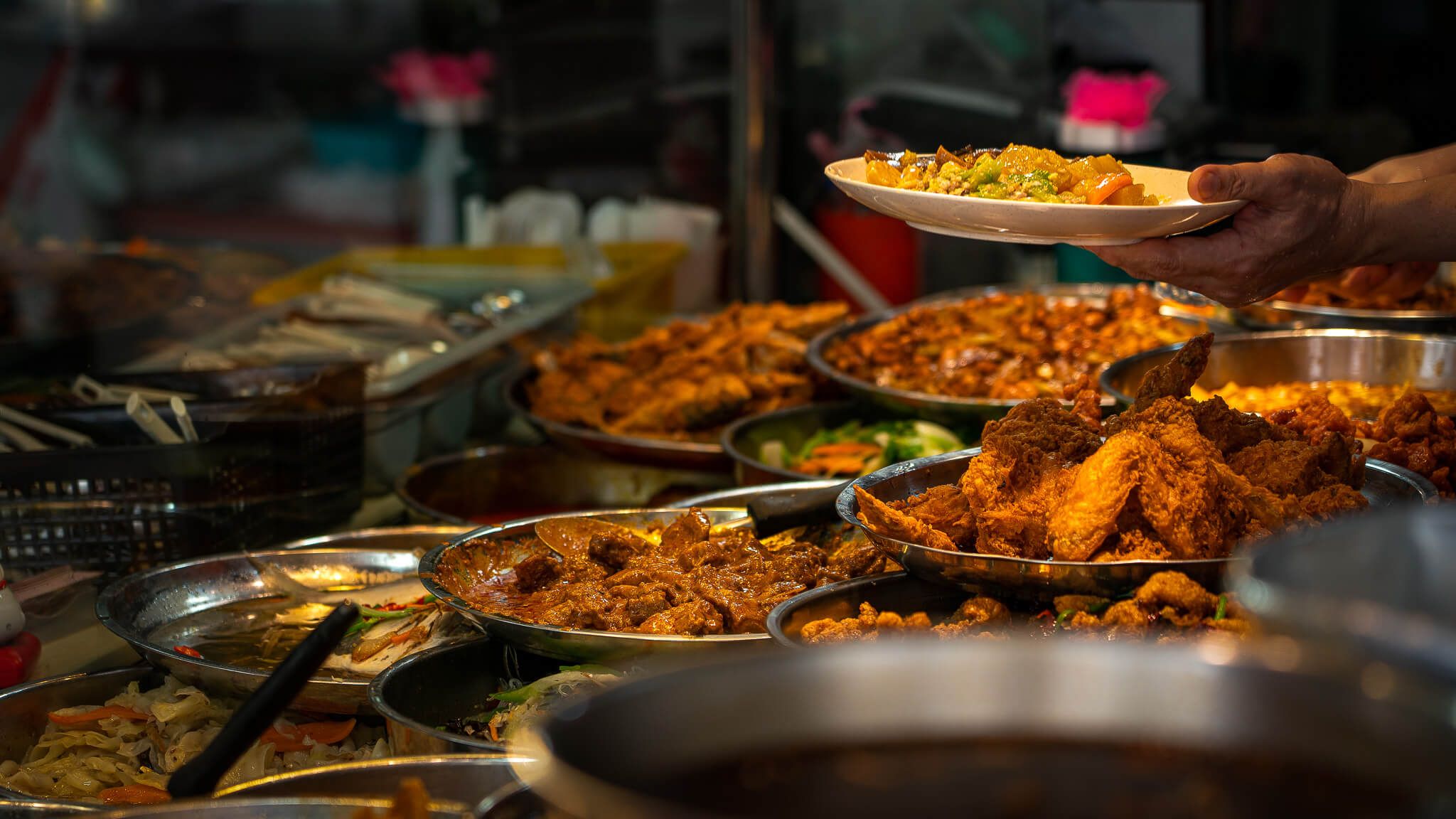 Wide range of Asian dishes at a food stall